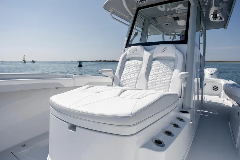 Slide: The Image of 2026 Yellowfin 36 Offshore boat with luxurious white seating on open water. - 26