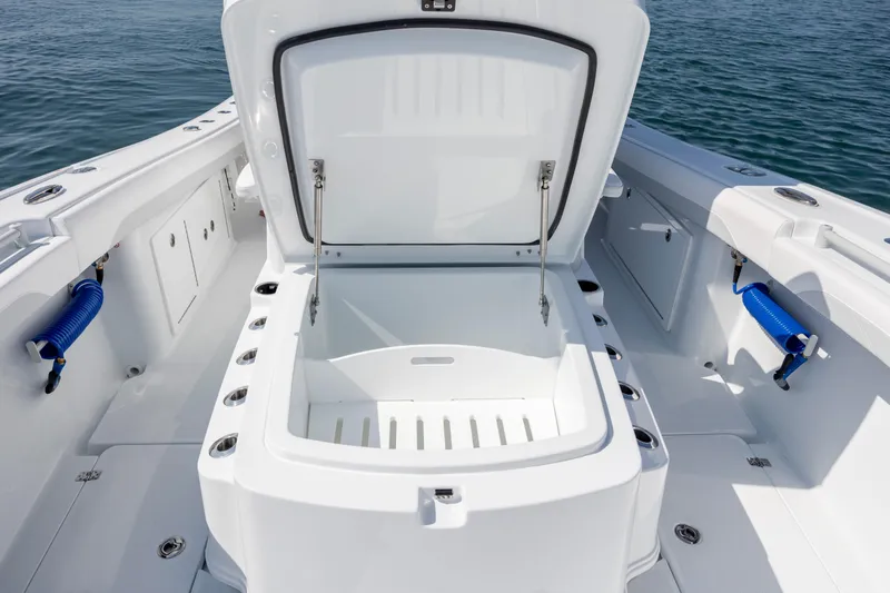 Slide: The Image of 2026 Yellowfin 36 Offshore boat with open storage compartment on deck. - 27