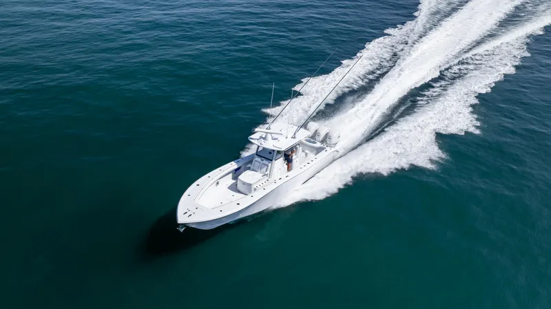 Slide: The Image of 2026 Yellowfin 36 Offshore boat cruising on open water. - 33