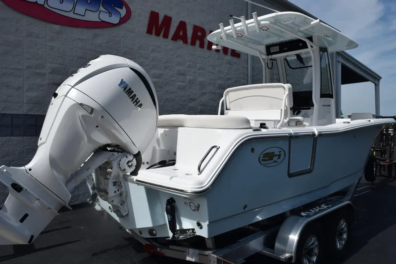 Slide: The Image of 2026 Sea Hunt Ultra 245 SE boat with Yamaha engine on trailer. - 4