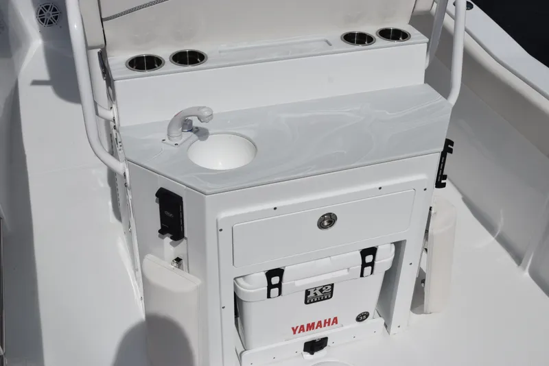 Slide: The Image of 2026 Sea Hunt Ultra 245 SE boat console with sink and Yamaha cooler. - 8