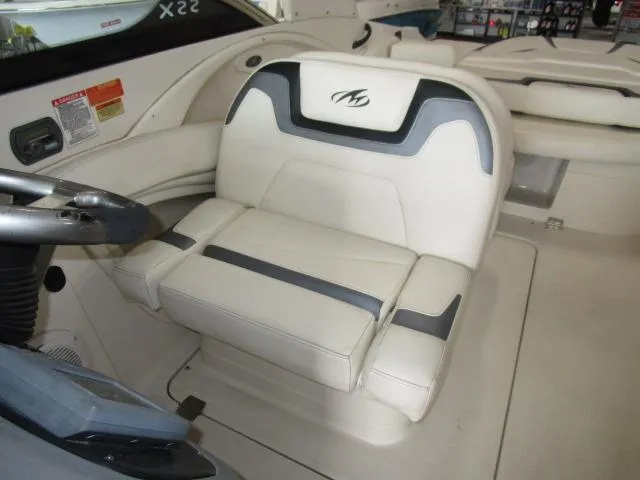 Slide: The Image of 2007 Monterey 298SSX Super Sport boat interior with white and gray seating. - 12