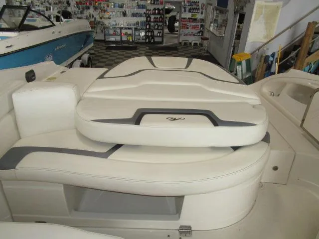 Slide: The Image of 2007 Monterey 298SSX Super Sport boat interior with white cushioned seating. - 14