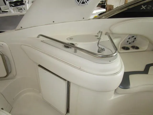 Slide: The Image of 2007 Monterey 298SSX Super Sport boat interior seating in a store setting. - 16