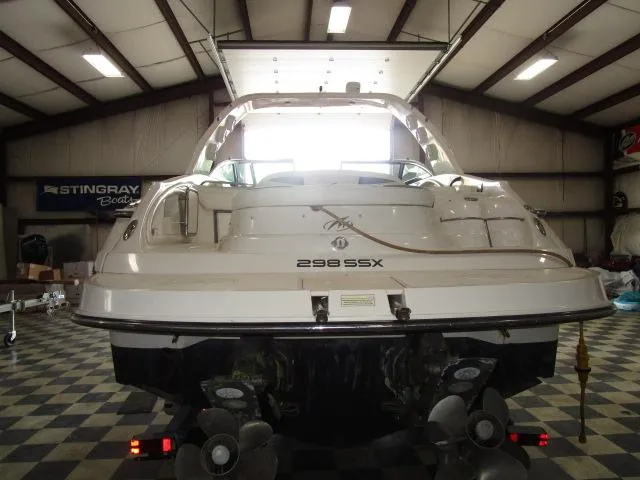 Slide: The Image of 2007 Monterey 298SSX Super Sport boat dashboard with steering wheel and control panel. - 3