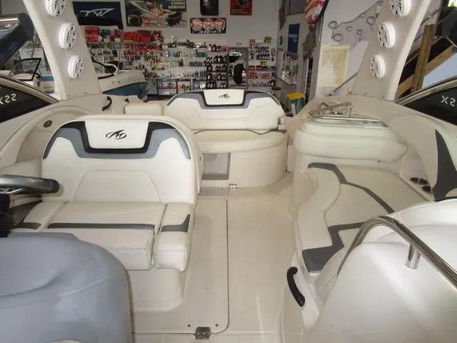 Slide: The Image of 2007 Monterey 298SSX Super Sport boat interior with white and gray seating. - 6