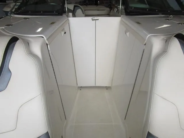 Slide: The Image of 2007 Monterey 298SSX Super Sport boat interior with sleek white design. - 8