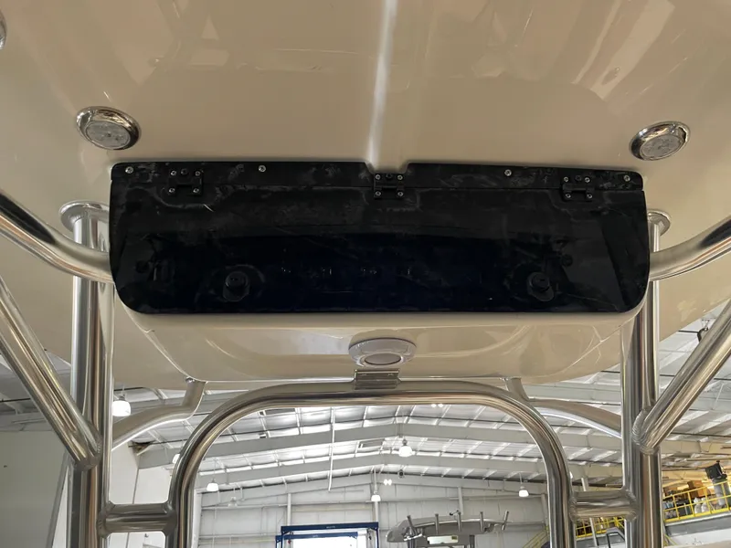 Slide: The Image of 2025 Key West 203 FS boat interior, featuring stainless steel framework and overhead panel. - 31