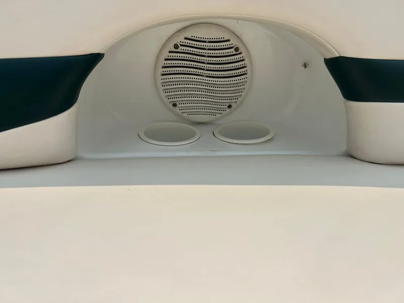 Slide: The Image of Storage compartment of 2000 Chaparral Sunesta 233 boat, white interior. - 16