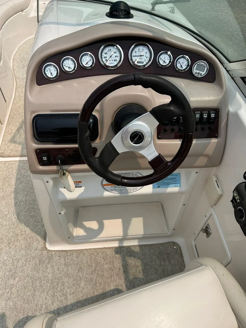 Slide: The Image of "Extended V Plane" emblem on 2000 Chaparral Sunesta 233 boat. - 19