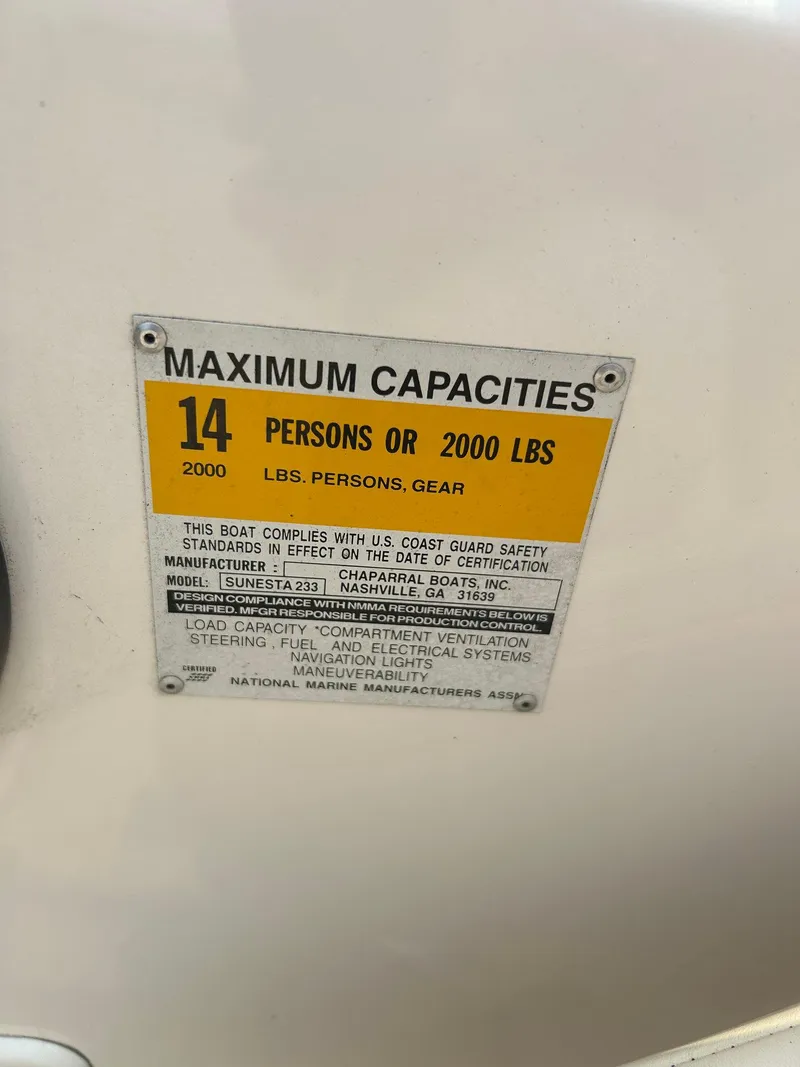 Slide: The Image of Chrome handle on 2000 Chaparral Sunesta 233 boat with safety warning label. - 20