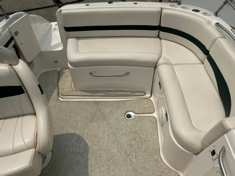 Slide: The Image of 2000 Chaparral Sunesta 233 boat rear view with outboard motor on trailer. - 28