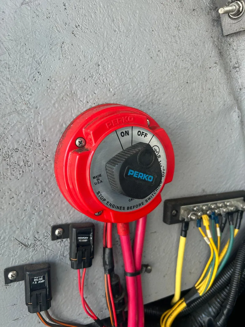 Slide: The Image of 2000 Chaparral Sunesta 233 boat interior with white and blue seating. - 29