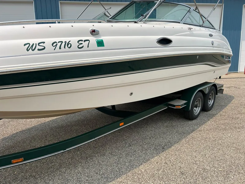 Slide: The Image of Chaparral Sunesta 233 2000 boat seat with white and blue upholstery. - 33