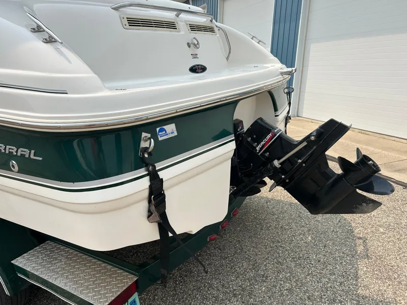 Slide: The Image of White and blue seating on 2000 Chaparral Sunesta 233 boat. - 36