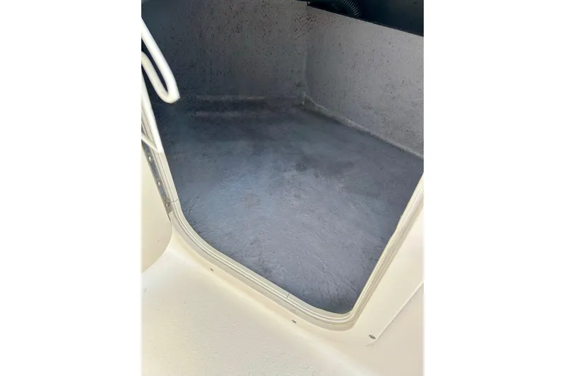 Slide: The Image of Interior storage compartment of 2000 Chaparral Sunesta 233 boat. - 62