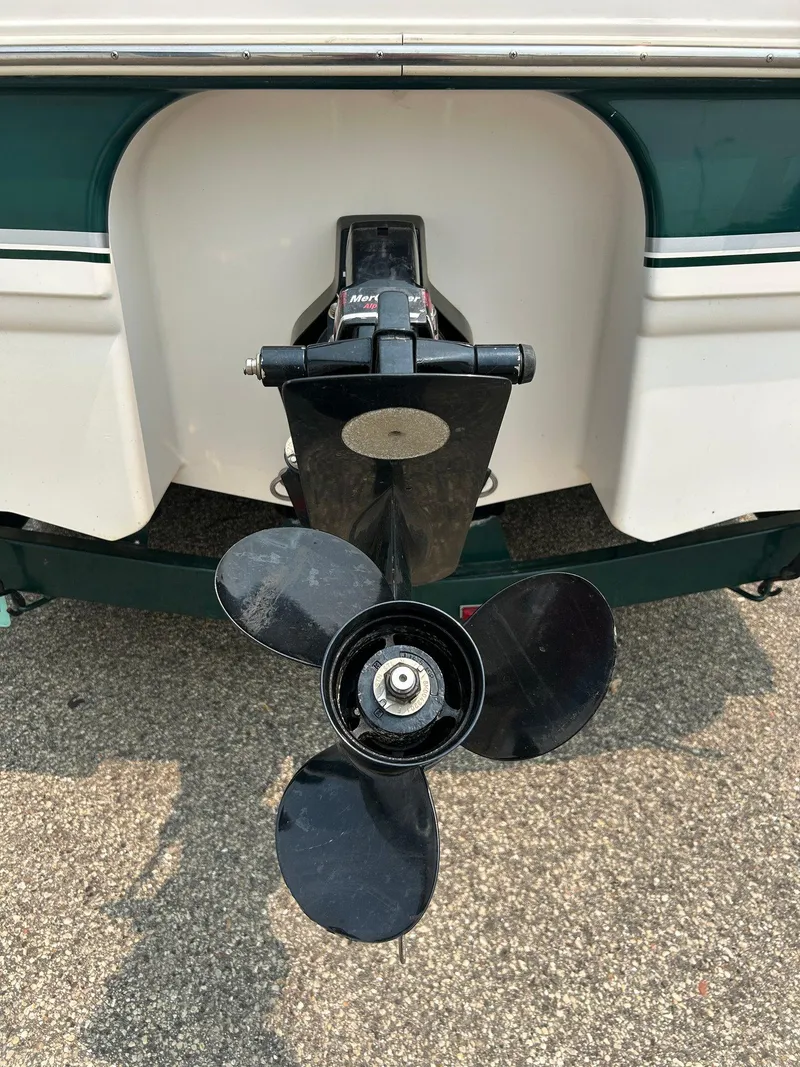 Slide: The Image of Steering console of 2000 Chaparral Sunesta 233 boat with gauges and controls. - 7