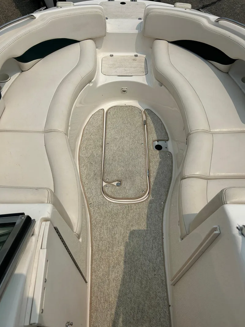 Slide: The Image of Rear view of 2000 Chaparral Sunesta 233 boat with Mercury outboard motor. - 8
