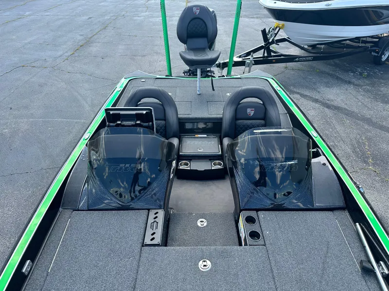 Slide: The Image of 2020 Triton 20 TRX Patriot boat interior with dual seats and console. - 13