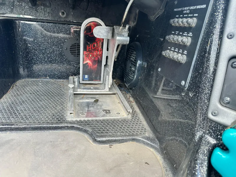 Slide: The Image of Foot pedal and circuit breaker panel in 2020 Triton 20 TRX Patriot boat. - 21