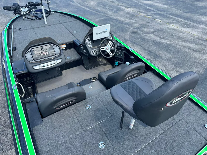 Slide: The Image of 2020 Triton 20 TRX Patriot boat interior with Garmin system and seating. - 7
