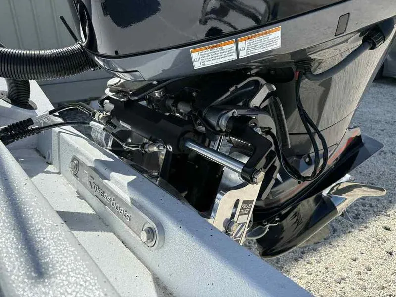 Slide: The Image of 2026 Xpress H22B boat engine close-up, showcasing mechanical components and branding. - 10