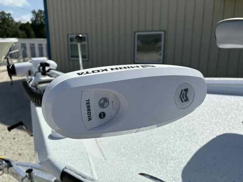 Slide: The Image of Minn Kota Terrova trolling motor on 2026 Xpress H22B boat, outdoor setting. - 9