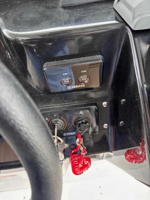 Slide: The Image of Control panel of a 2019 Beneteau Antares 27 with Yamaha ignition keys. - 17