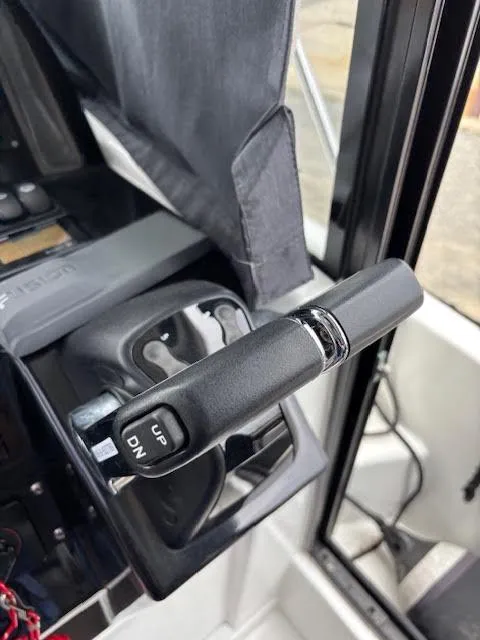 Slide: The Image of Throttle control lever on a 2019 Beneteau Antares 27 boat cockpit. - 25