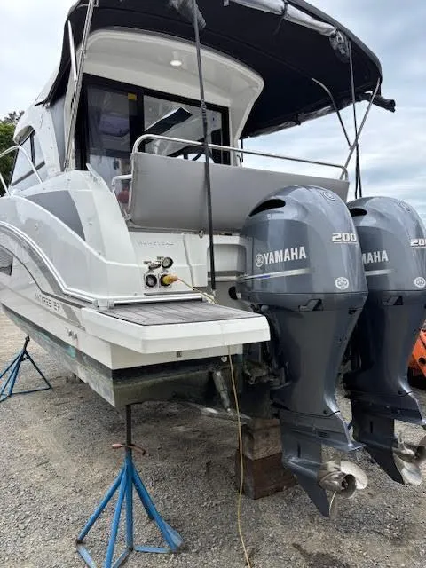 Slide: The Image of 2019 Beneteau Antares 27 with twin Yamaha 200 engines on stands. - 4