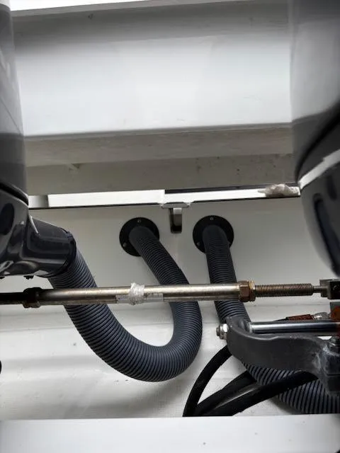 Slide: The Image of Close-up of 2019 Beneteau Antares 27 boat engine components and hoses. - 7