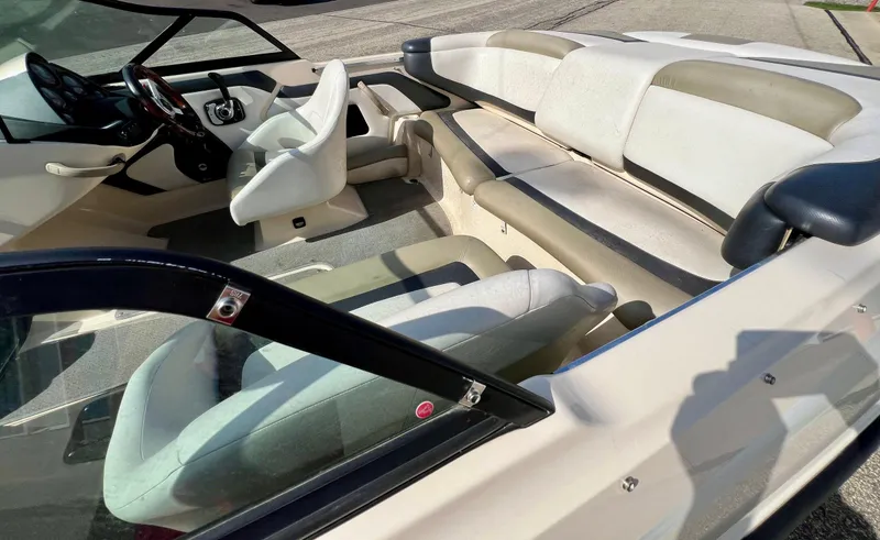 Slide: The Image of 2007 Sea-Doo 205 Utopia boat interior with seating and steering wheel. - 5
