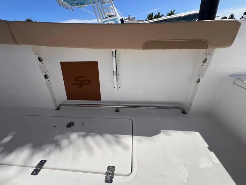 Slide: The Image of 2026 Sea Pro 262 Sport boat interior with seating and storage compartments. - 10