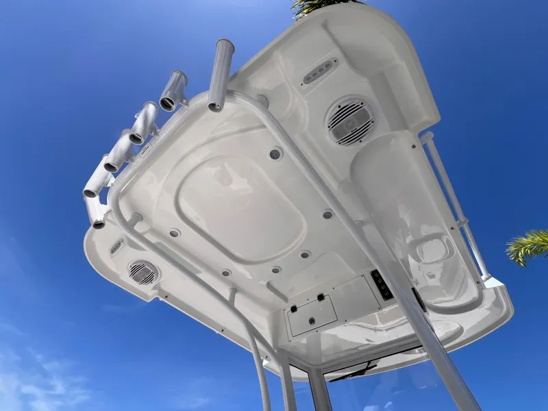 Slide: The Image of 2026 Sea Pro 262 Sport boat top view against clear blue sky. - 31