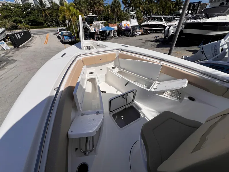 Slide: The Image of 2026 Sea Pro 262 Sport boat interior with open storage compartments and seating. - 35