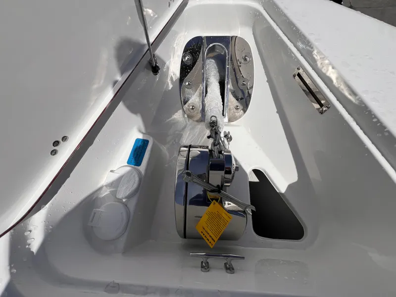 Slide: The Image of Anchor compartment of 2026 Sea Pro 262 Sport boat with winch and rope. - 42