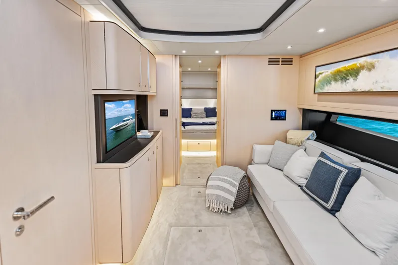 Slide: The Image of Luxurious interior of 2026 Scout 670 LXS yacht with modern furnishings and entertainment system. - 27