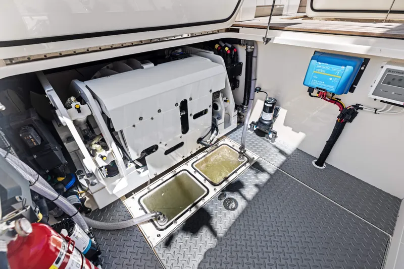 Slide: The Image of Engine compartment of 2026 Scout 670 LXS boat with modern equipment and wiring. - 47