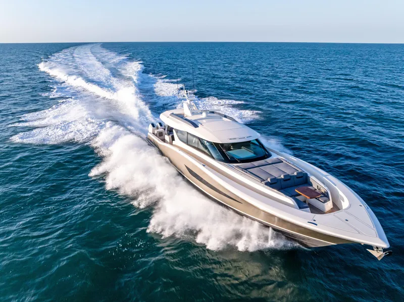 Slide: The Image of 2026 Scout 670 LXS luxury yacht cruising on open sea, leaving a trail of waves. - 5