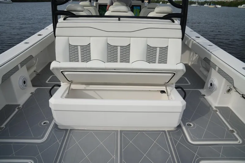 Slide: The Image of 2022 Invincible 46 Catamaran with open storage compartment on deck. - 20