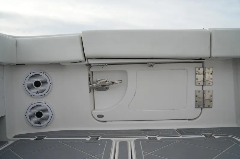 Slide: The Image of Invincible 46 Catamaran 2022 interior detail with speakers and storage compartment. - 22