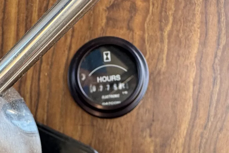 Slide: The Image of Hour meter on 1985 Bluewater Yachts 51 Coastal Cockpit MY, mounted on wood panel. - 44
