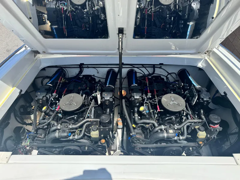 Slide: The Image of Twin engines in a 2006 Formula 292 boat, showcasing detailed mechanical components. - 22