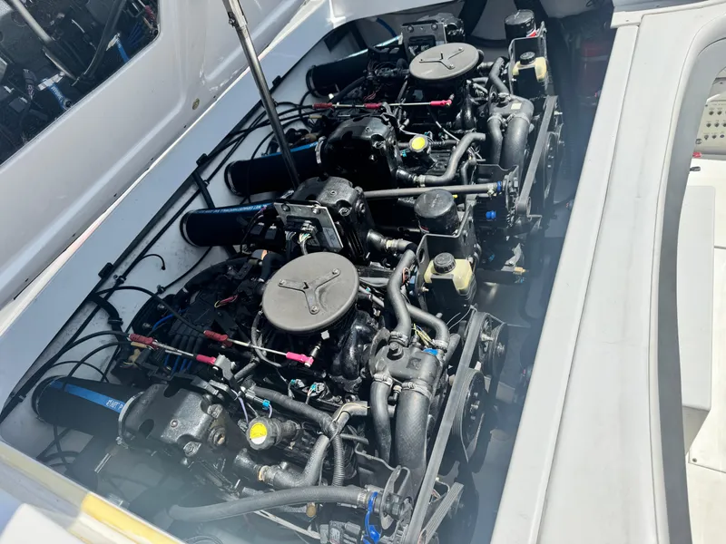 Slide: The Image of Twin engines in a 2006 Formula 292 boat, showcasing detailed mechanical components. - 23