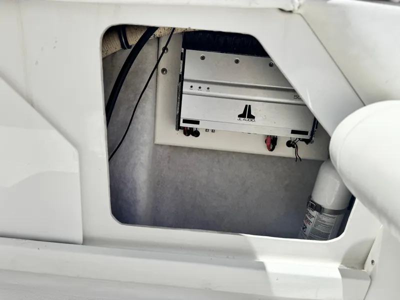 Slide: The Image of JL Audio amplifier installed in a 2006 Formula 292 boat compartment. - 34