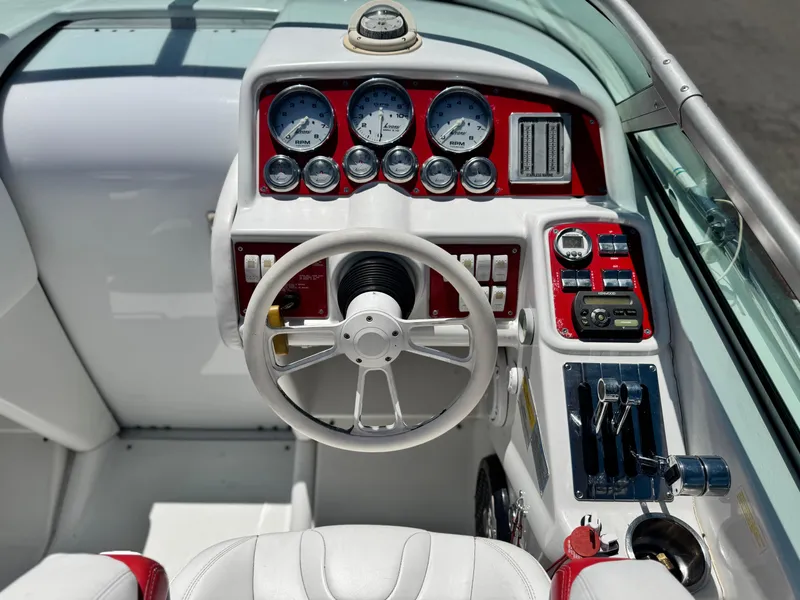 Slide: The Image of Dashboard of a 2006 Formula 292 boat with gauges and controls. - 37