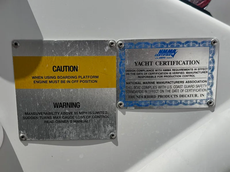 Slide: The Image of Caution and certification labels on a 2006 Formula 292 boat, highlighting safety and compliance. - 39