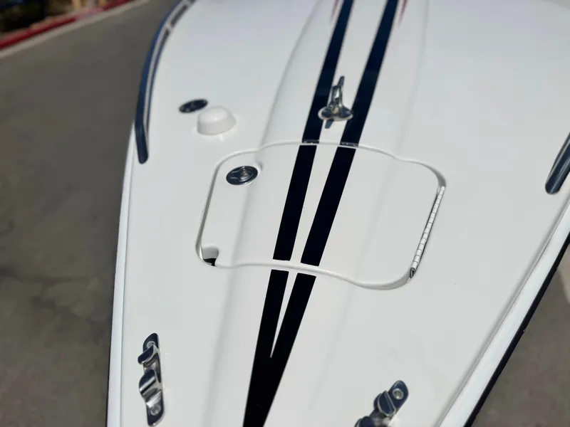Slide: The Image of Close-up of 2006 Formula 292 boat deck with sleek black stripes and hardware. - 5