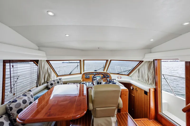 Slide: The Image of Luxurious interior of 2008 Navigator 5100 yacht with polished wood and ocean view. - 21
