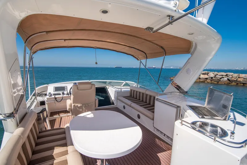 Slide: The Image of Luxurious 2008 Navigator 5100 yacht interior with seating, table, and ocean view. - 25